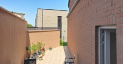 Maison deux chambres avec garage et jardin