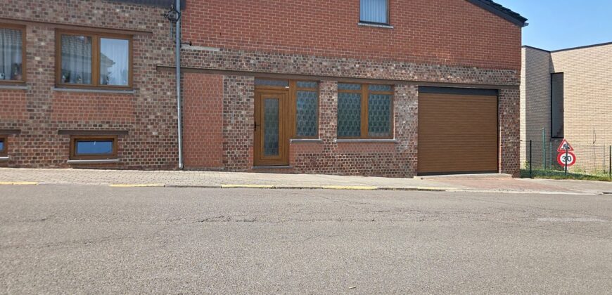 Maison deux chambres avec garage et jardin
