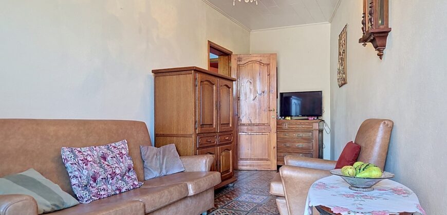 Maison deux chambres avec garage et jardin