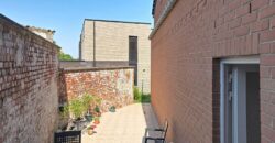 Maison deux chambres avec garage et jardin