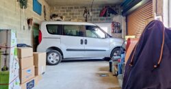 Maison deux chambres avec garage et jardin