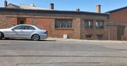 Maison deux chambres avec garage et jardin