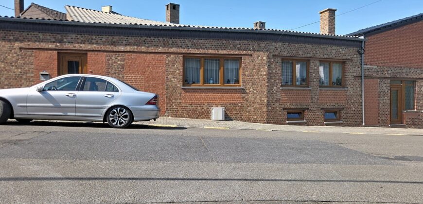 Maison deux chambres avec garage et jardin