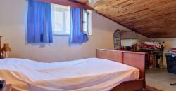 Maison deux chambres avec garage et jardin