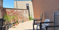 Maison deux chambres avec garage et jardin